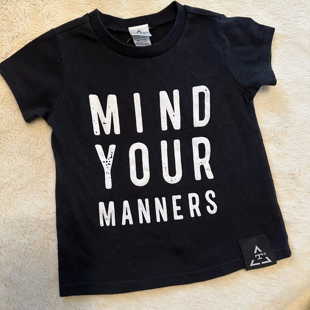 Kids Black Tee with 'Mind Your Manners' Graphic